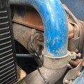 Ford 4610 3 Cyl Diesel - What is that part attached to the intake pipe? It has  a black and white wire going to it.