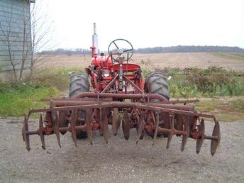 Farmall 140 With MF-25 Disk