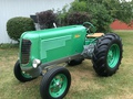 1939 Oliver 70 STD. - My version of a customized Oliver 70 .I took a lot of liberty in restoring this tractor. Hope the true blue tractor police won