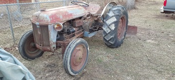 1944 2N - My first antique tractor. According to  what research I've found the tractor is  a early production 1944 due to the  serial number (9N128405) and the I-beam  radius arms. Im still deciding to paint  it back to original  color or keep the  patina.