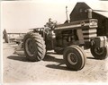  Massey Ferguson 1100 Diesel -  Me sitting on the tractor, about 1969 at the Bismark farm in Stanchfield Minnesota, pretty sure that is uncle George Bismark standing by Dad